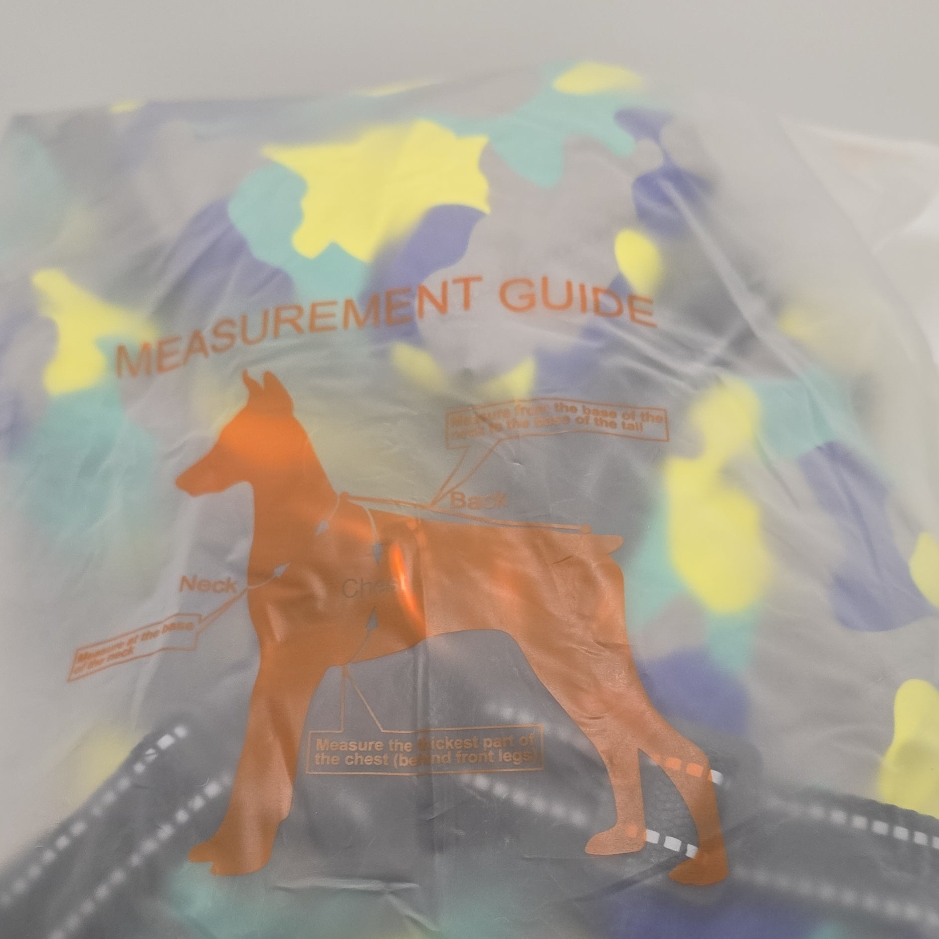 New with tags Dog Jacket. Blue Yellow camouflage, padded, zippered